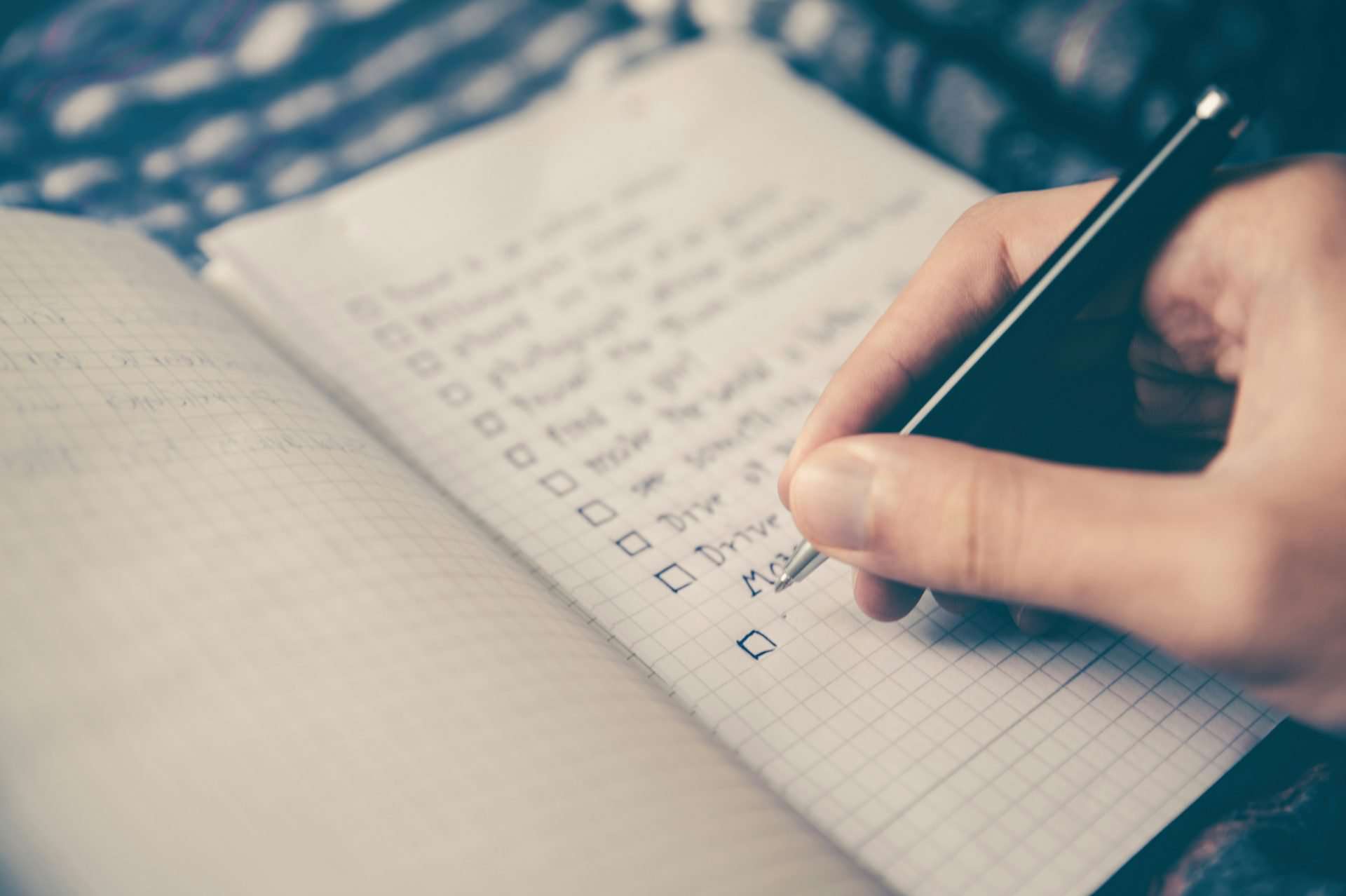 Checklist with black pen